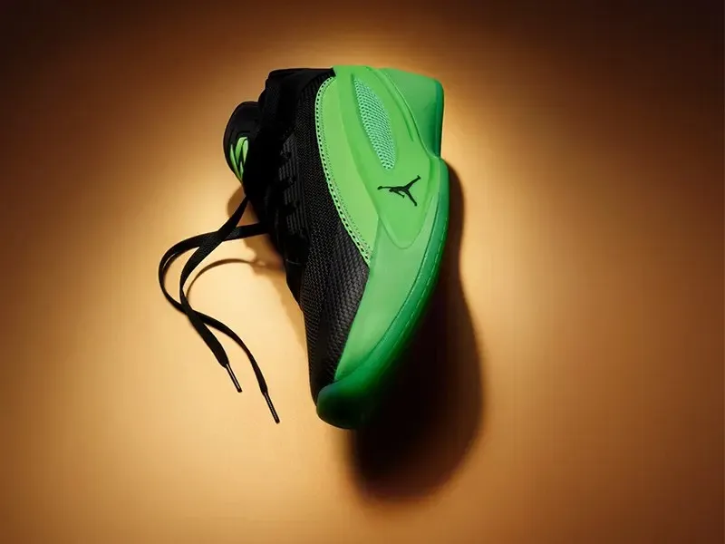 Front profile of the Jordan Luka 5 Venom sneaker featuring a black upper with Electric Green Isoplate and supercar-inspired design details.