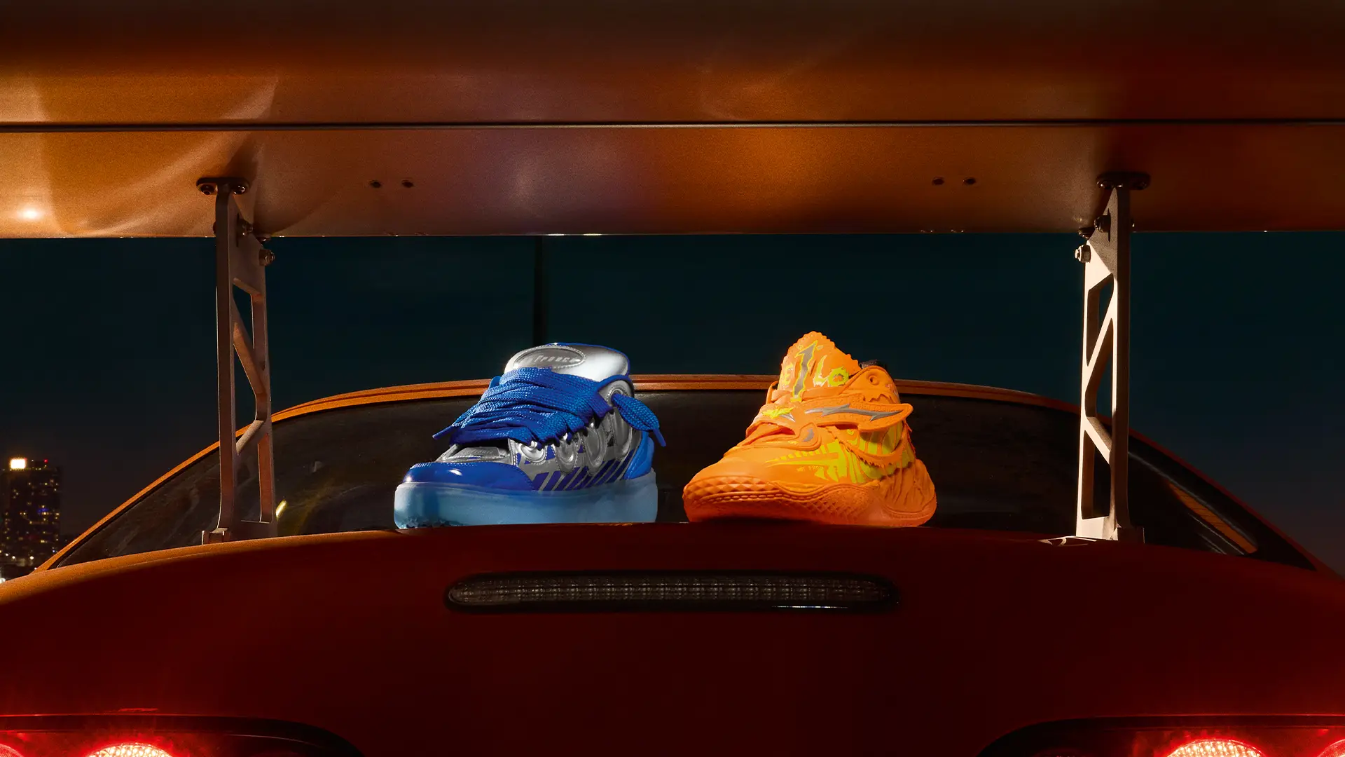 PUMA x Fast & Furious 2026 collection hero collage featuring the orange Supra MB.05, pink Suki S2000 MB.05, and black Dom Charger LaFrancé RNR.