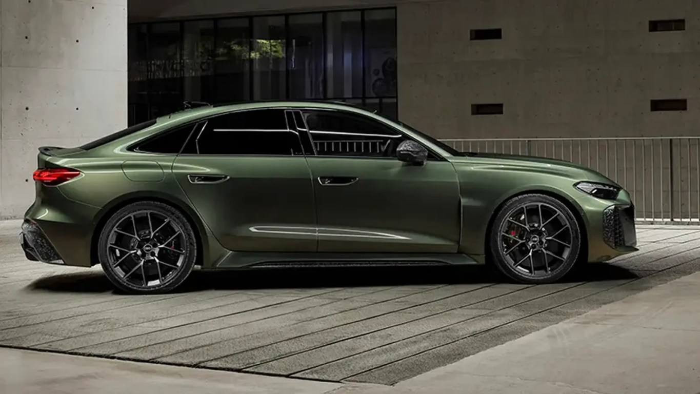 A profile shot of the 2027 Audi RS5 in Bedford Green, highlighting its widened stance and aggressive RS bodywork.