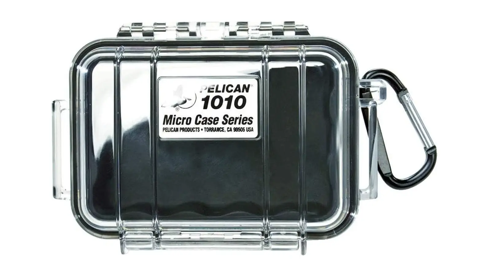 A top-down view of the Pelican 1010 Micro Case in solid black. The image emphasizes the industrial latch system, the automatic pressure equalization valve, and the rugged, crushproof exterior designed for archiving vintage tech artifacts.