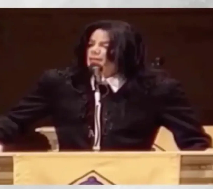Michael Jackson delivers his historic 'Heal the Kids' address at the Oxford Union in 2001, wearing a black military-inspired tunic and speaking on the global architecture of child welfare.