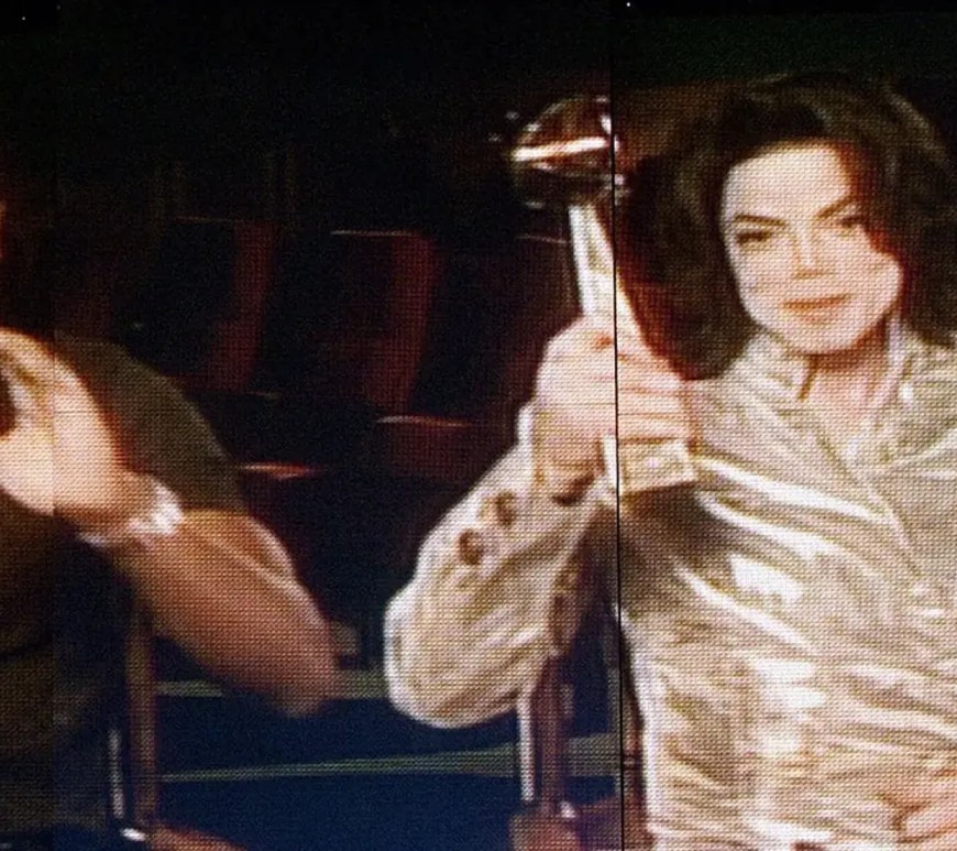 A candid archival photograph of Michael Jackson and Chris Tucker, documenting the private friendship and mutual creative influence between the global icon and the comedian.