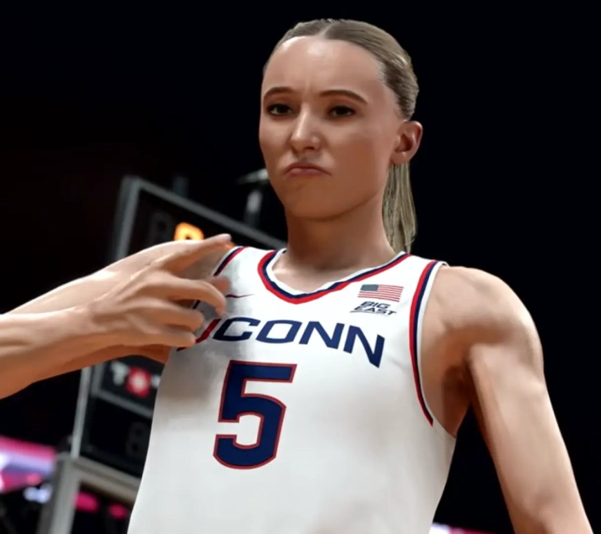 A high-fidelity in-game screenshot of Paige Bueckers in NBA 2K26 Season 5, wearing a licensed UConn throwback jersey. The image showcases the ProPLAY skeletal physics and 4K texture rendering of the Dallas Wings star in a mid-range jump shot motion.