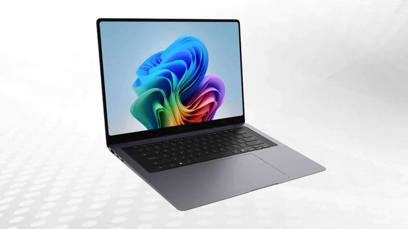 Side profile of the gunmetal gray Samsung Galaxy Book6 Ultra showing the 15.4mm ultra-slim chassis and integrated ports.