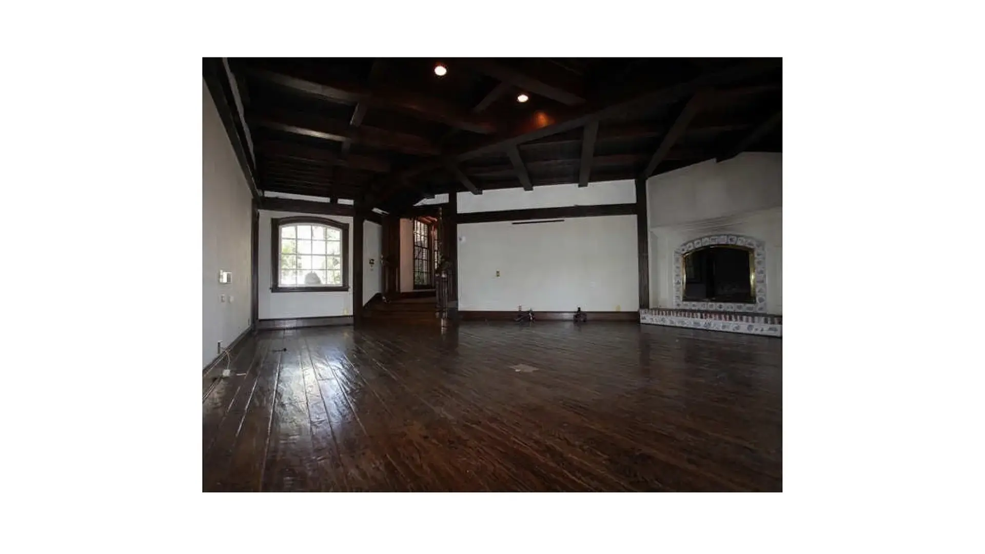A wide-angle interior view of Michael Jackson’s private bedroom suite at the Neverland Valley Ranch, documenting the ornate furniture and spatial design that Macaulay Culkin frequented as a primary witness to Jackson’s private life.