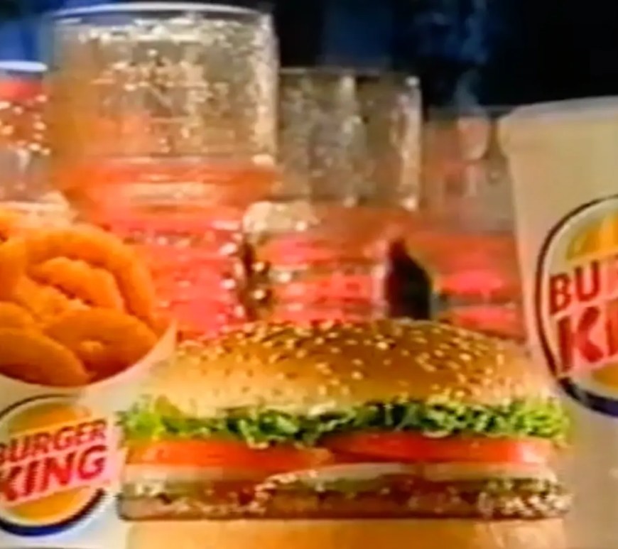 Detailed view of the 2001 Burger King Fellowship of the Ring light-up glasses showcasing the gold LED pedestal and frosted map etching.