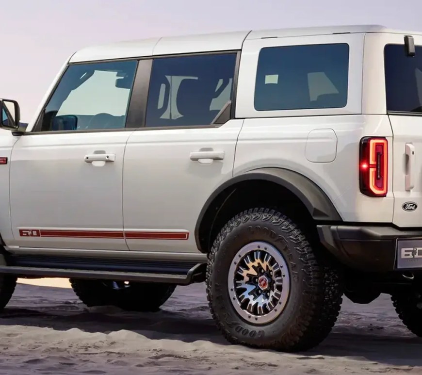 2026 Ford Bronco 60th Anniversary Edition in Wimbledon White with 35-inch tires.