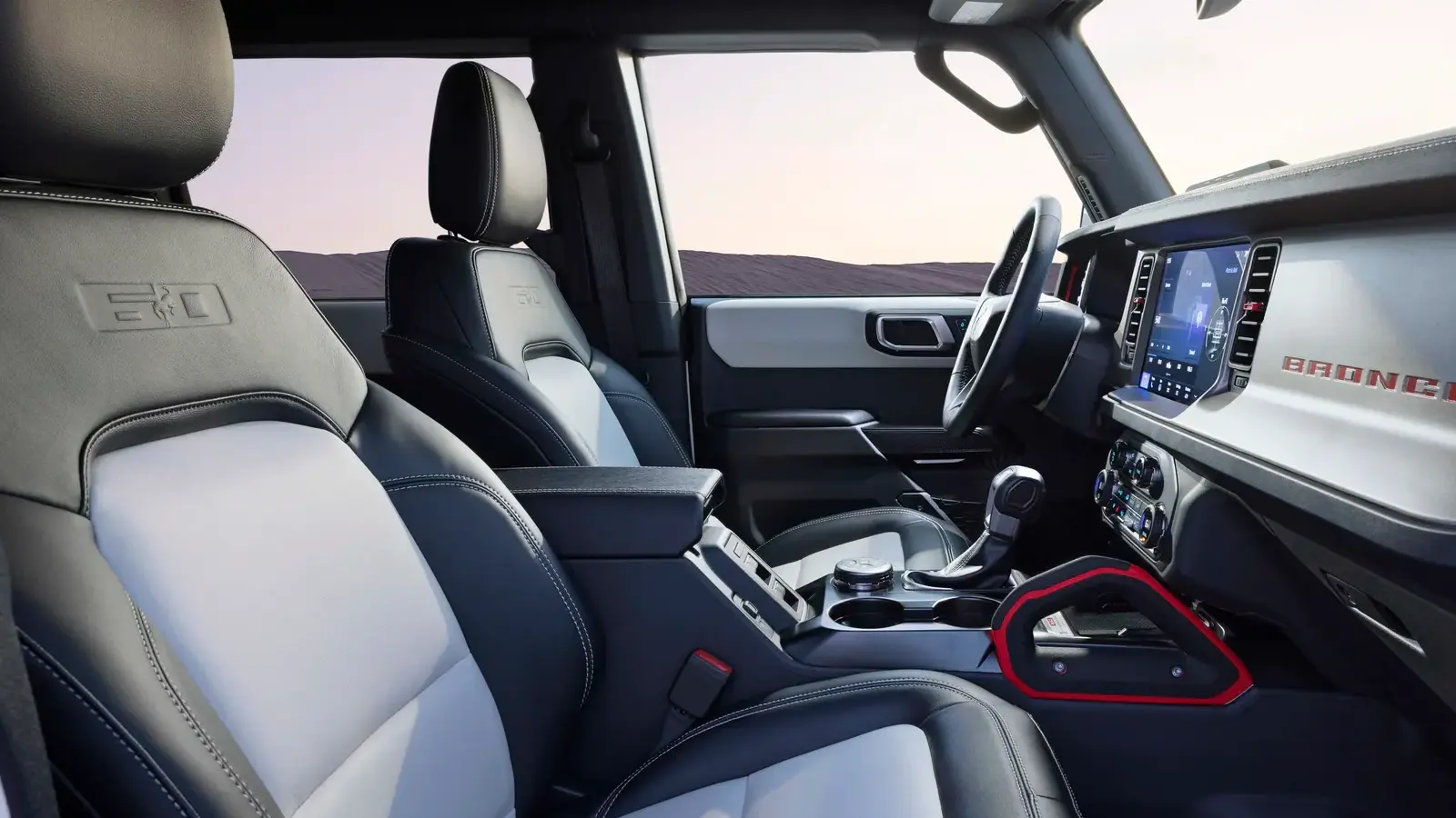2026 Ford Bronco 60th Anniversary Edition in Wimbledon White with 35-inch tires and interior.