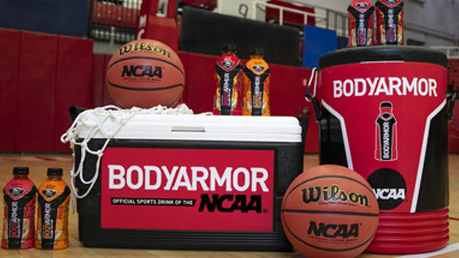 Official BodyArmor sideline hydration kit for the 2026 NCAA March Madness tournament, featuring high-contrast branded coolers and ergonomic pro-style squeeze bottles for elite athlete performance.
