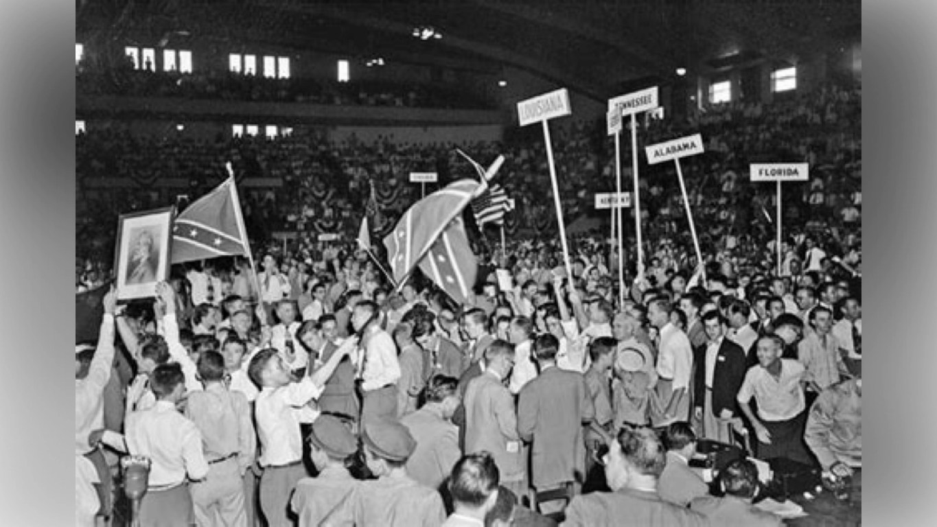 Delegates at the 1948 Dixiecrat National Convention waving state flags and holding signs supporting Strom Thurmond’s segregationist platform. The Real History Behind Nick Cannon’s Claims About Democrats and Republicans