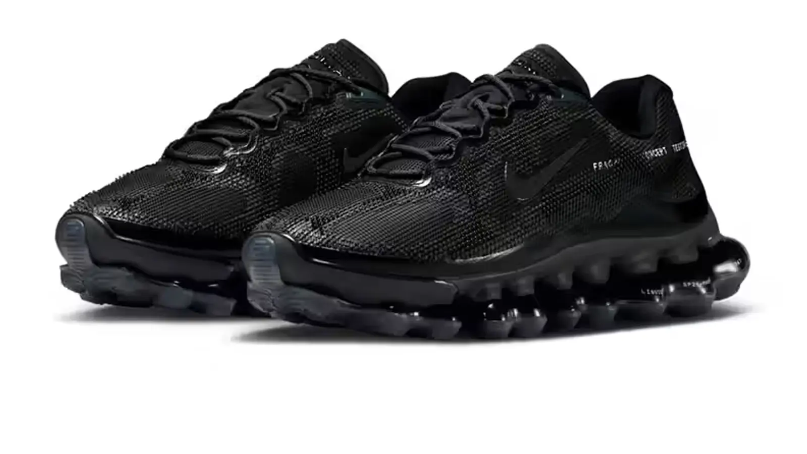 A technical close-up shot of the Nike Air Liquid Max’s segmented point-loaded Air unit, highlighting the flattened and widened liquid-look pods and the translucent outsole architecture designed for 2026 fluid motion engineering.