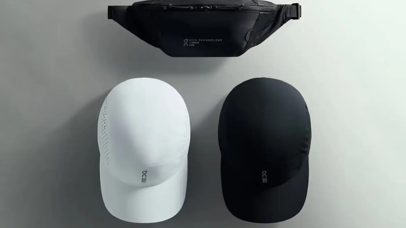 The Kith x On Lightweight Cap 2.0 in white and, showing the perforated side panels and reflective co-branding on the front.