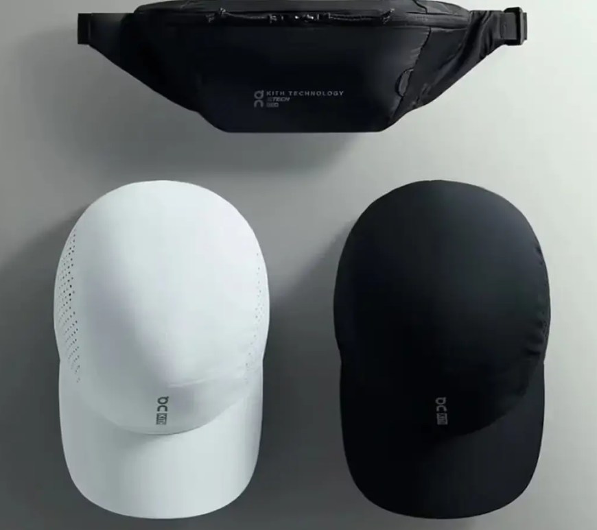 The Kith x On Lightweight Cap 2.0 in white and, showing the perforated side panels and reflective co-branding on the front.