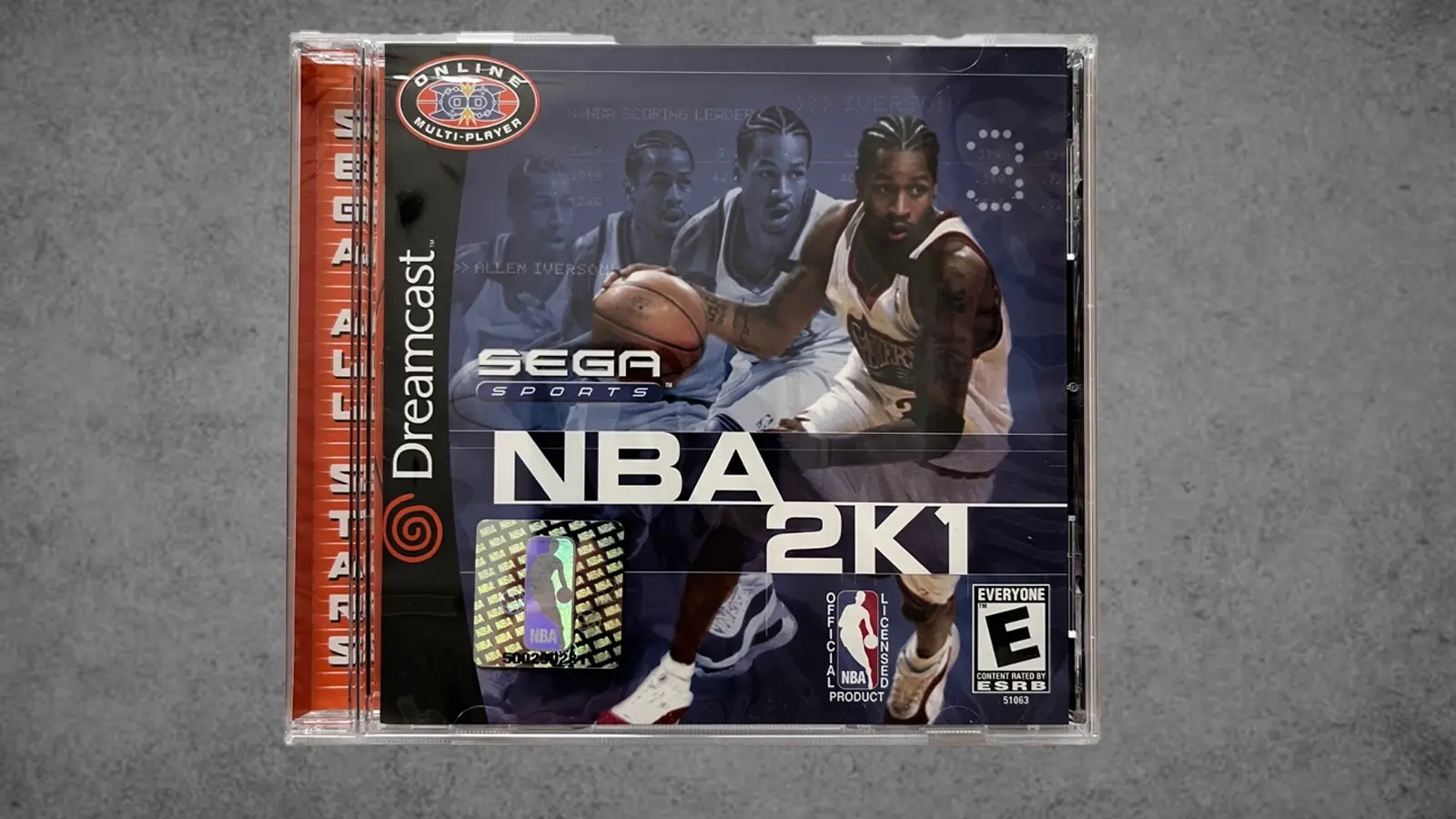 The North American cover of NBA 2K1 for the Sega Dreamcast, featuring Allen Iverson in his white 76ers jersey, symbolizing the birth of online console basketball and early 2000s streetball culture.