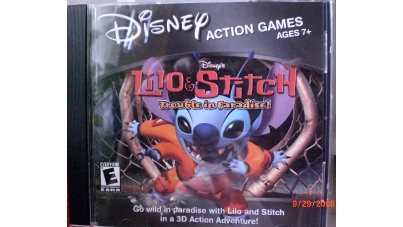Original North American cover art for Disney’s Lilo & Stitch: Trouble in Paradise on PlayStation 1 featuring Stitch and Lilo on a tropical Hawaiian beach.