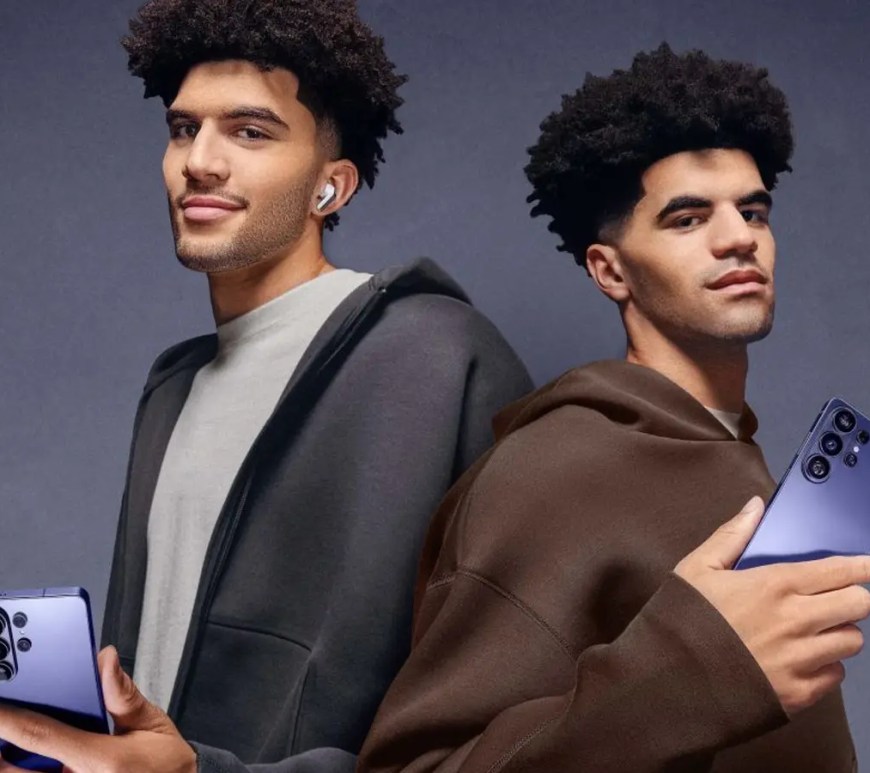 Duke basketball stars Cameron and Cayden Boozer in a 2026 NIL campaign for the Samsung Galaxy S26 Ultra. The image showcases the 'Flex Magic Pixel' privacy display technology, with one twin viewing the sharp OLED screen head-on while the other, viewed from a side angle, sees a darkened, private display.