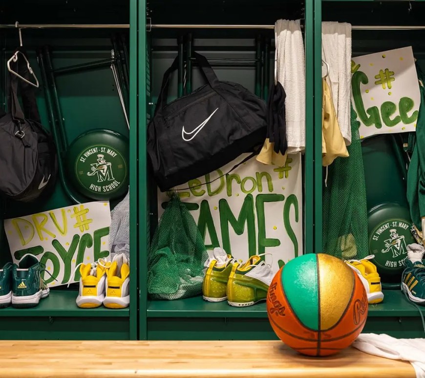 Interior view of LeBron James's Home Court museum in Akron, featuring the recreation of his childhood Apartment 602 and high school basketball artifacts.