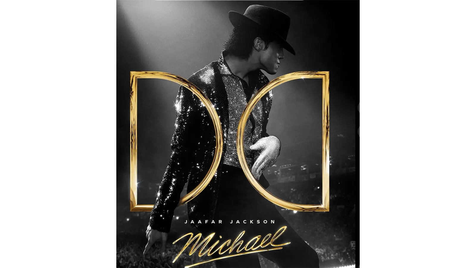 A close-up of a massive Dolby film reel for the ‘Michael’ (2026) biopic, showcasing the physical scale of the analog format that provides 18K-equivalent resolution for the stadium concert sequences.