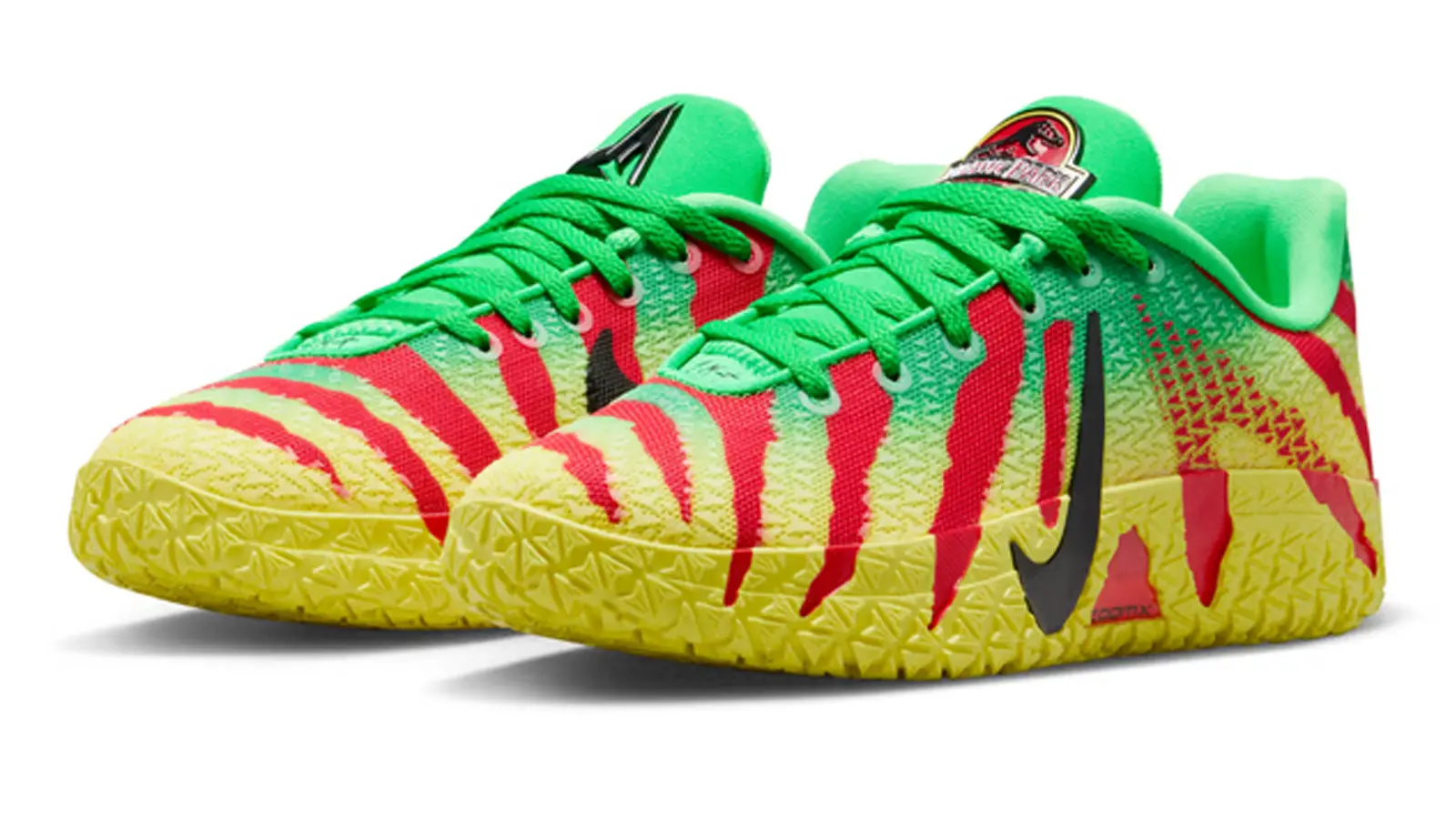 Technical product shots of the Nike Ja 3 'Jurassic Park' collection in Anthracite and Green Spark, highlighting the T-Rex logo and the tour-vehicle inspired livery.