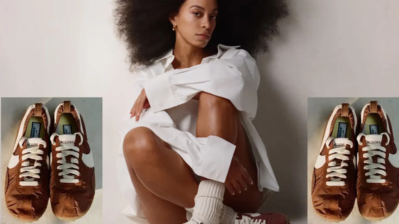 Solange Knowles showcasing the brown Nike x Jacquemus Moon Shoe with a white button down and natural hair.