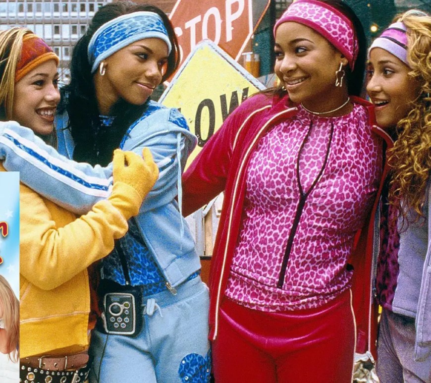 The Cheetah Girls (2003) movie poster featuring Raven-Symoné, Adrienne Bailon, Kiely Williams, and Sabrina Bryan in iconic colorful tracksuits and cheetah print headbands against a New York City backdrop.