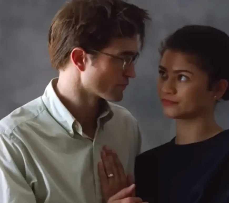 Stylized graphic for 'The Drama' (2026) featuring Robert Pattinson and Zendaya, capturing the film’s psychological tension.