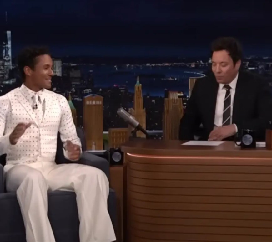 Jaafar Jackson smiling on The Tonight Show Starring Jimmy Fallon while discussing his role in the Michael Jackson biopic.