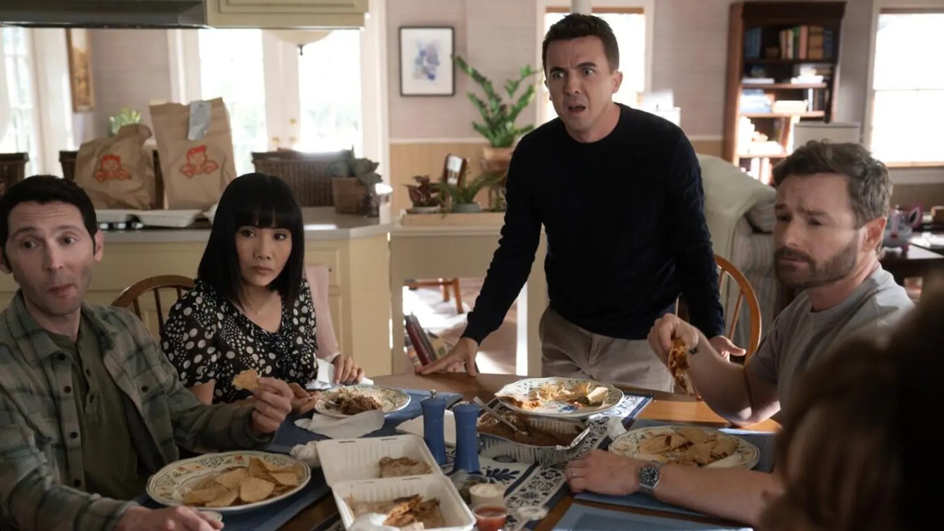 Frankie Muniz as adult Malcolm, looking stressed in his first 4th-wall break of the new season.