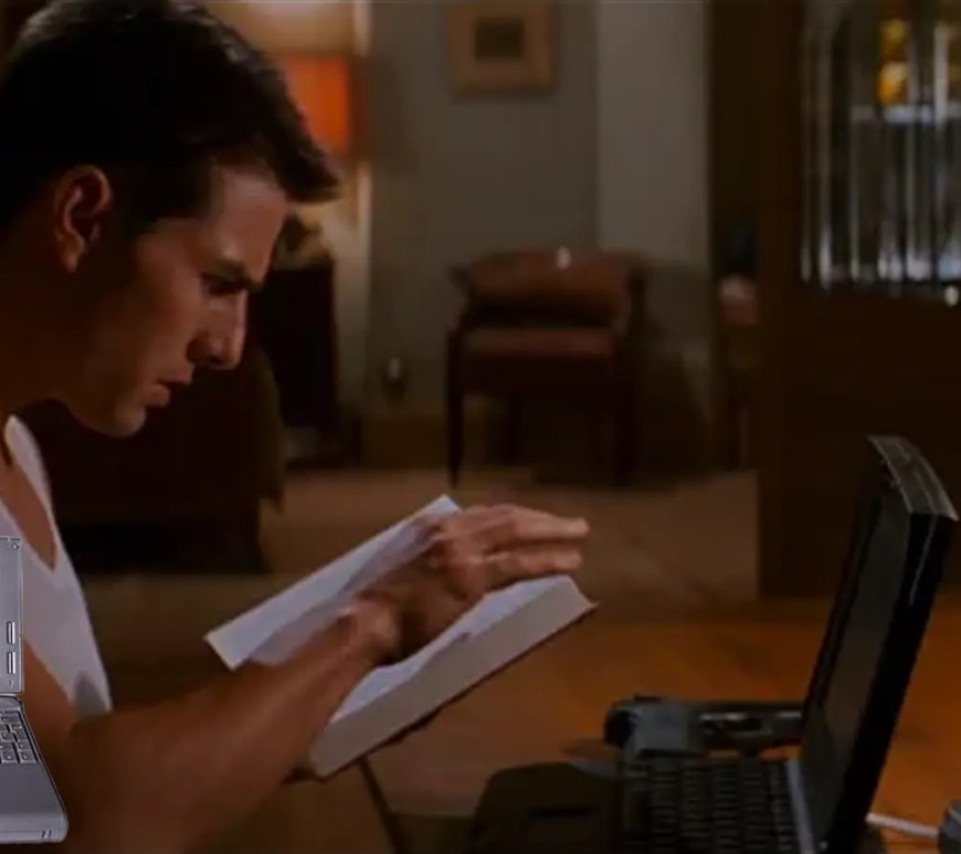 Tom Cruise as Ethan Hunt using the 1996 Apple PowerBook.