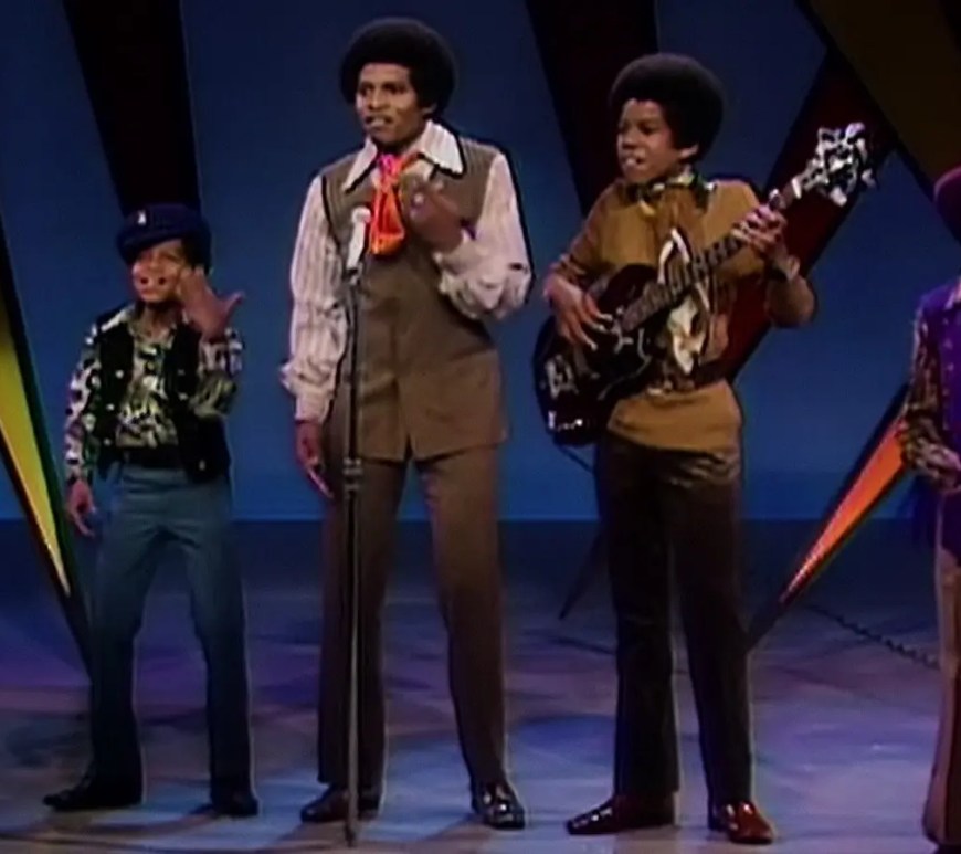 he Jackson 5 performing their hit songs with synchronized dance moves on The Ed Sullivan Show in 1969.
