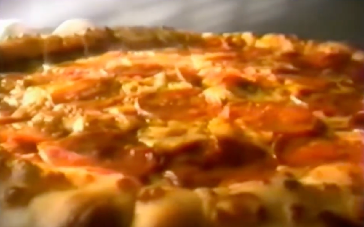 A still from Pizza Hut's stuffed crust promo circa 1995