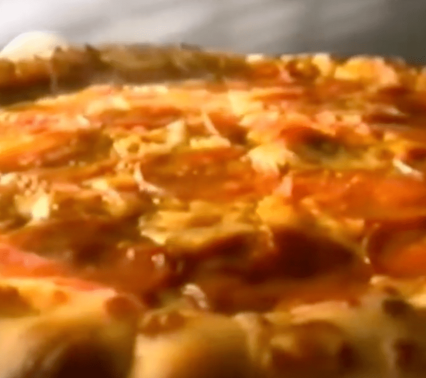 A still from Pizza Hut's stuffed crust promo circa 1995