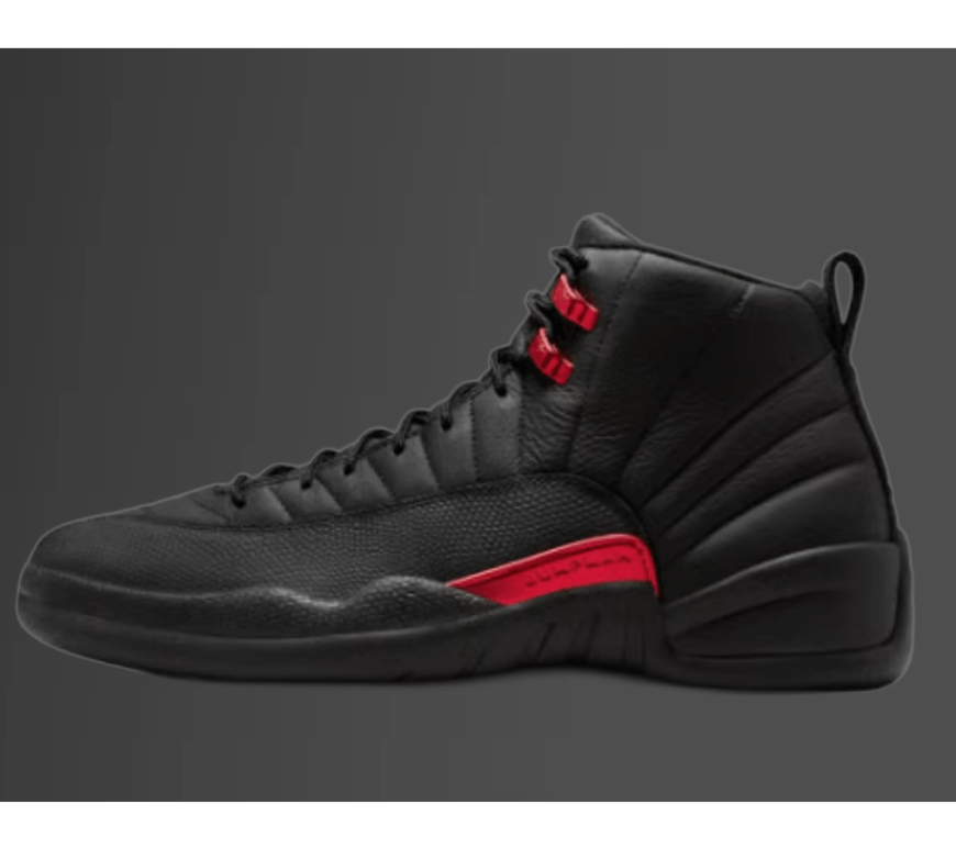 Side profile view of the Air Jordan 12 Bloodline sneaker, highlighting the iconic stitched paneling and the varsity red midfoot branding tab.