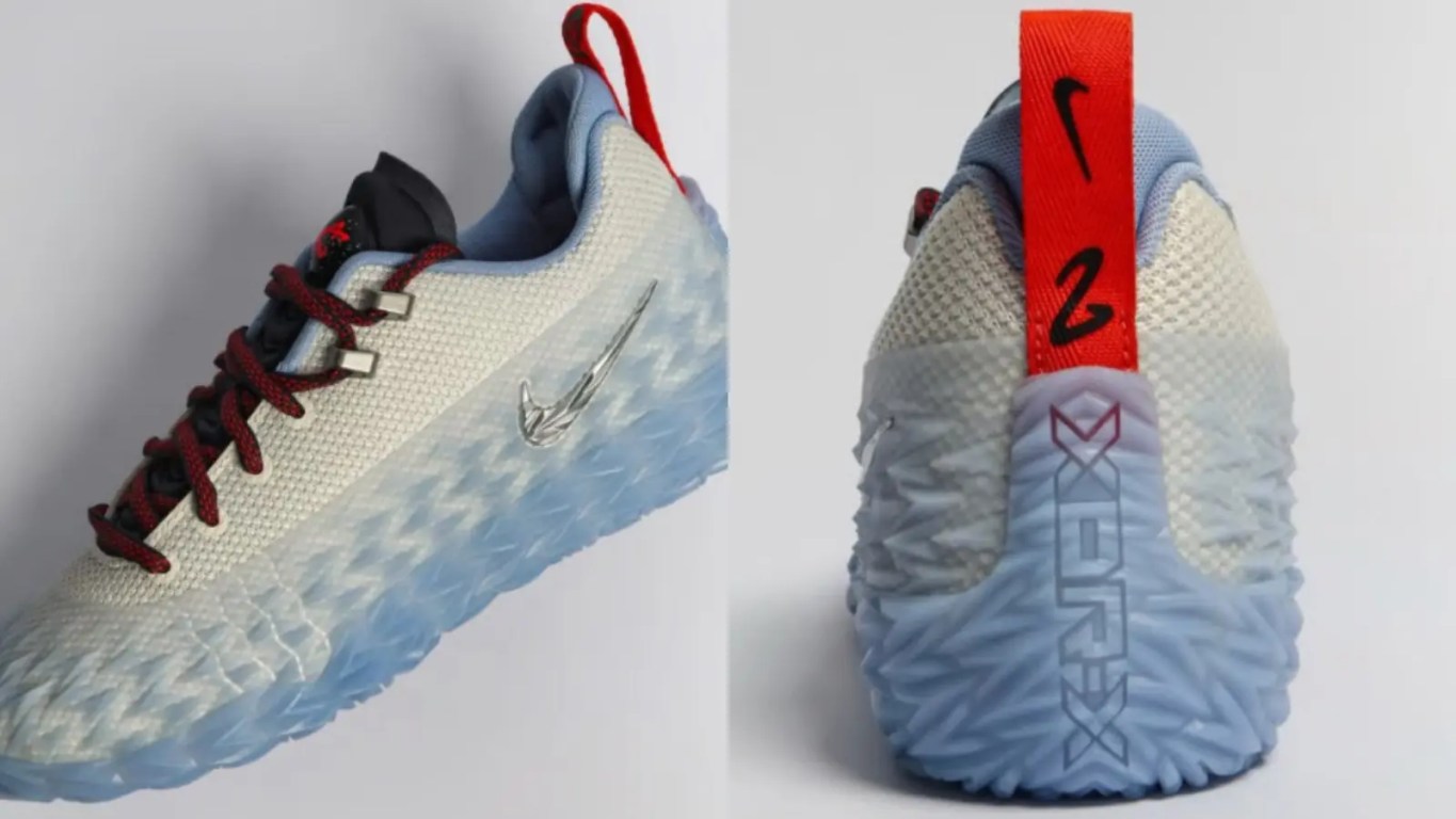Front and Side profile of the Nike ST Charge Cade Cunningham Detroit Tough sneaker, featuring a white reinforced mesh upper encased in a geometric, icy translucent blue TPU armor overlay that spans from the toe box to the heel, accented by a metallic silver Swoosh on the midsole and custom red and blue athletic laces.