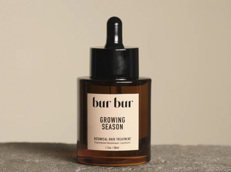 A product shot of the Bur Bur Burdock Root Hair Oil