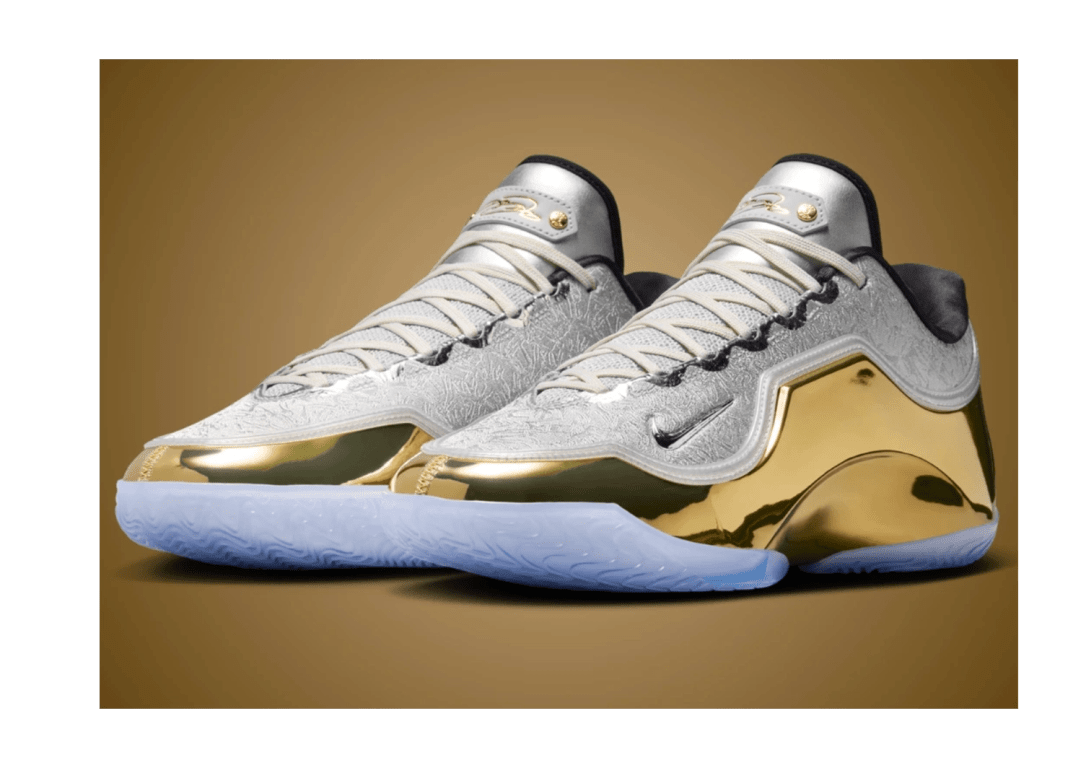 Side profile of the 2026 Nike LeBron 23 Lux Dreams and Nightmares sneaker, showing the metallic silver jacquard upper and gold-plated crown containment armor.