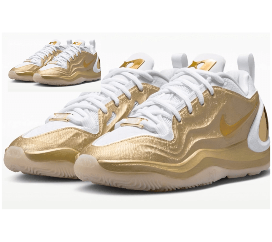 A look at the Nike A'Two Signature Shoe with gold detailing and white laces.