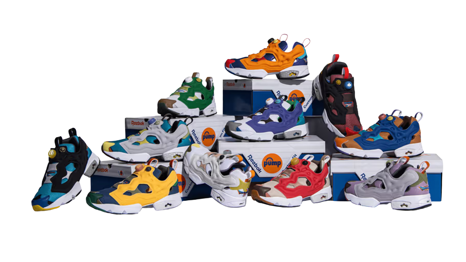 A studio lineup of the 11 different Reebok x Dragon Quest Instapump Fury 94 sneakers, showcasing the various bright game-inspired colorways and Slime pump balls.