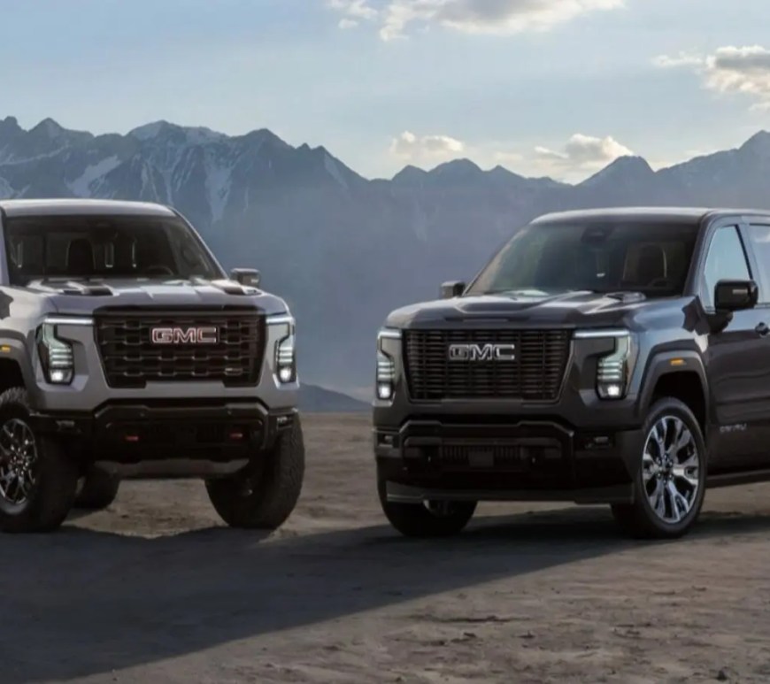 A clean, high-resolution automotive profile shot displaying the redesigned front grille and bright LED headlights of the premium 2027 GMC Sierra 1500 Denali truck.