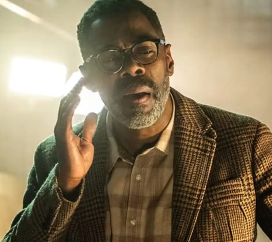 A dramatic close-up promotional still of Colman Domingo as Hugo from Steven Spielberg's 'Disclosure Day', sitting intensely during a high-stakes scene.