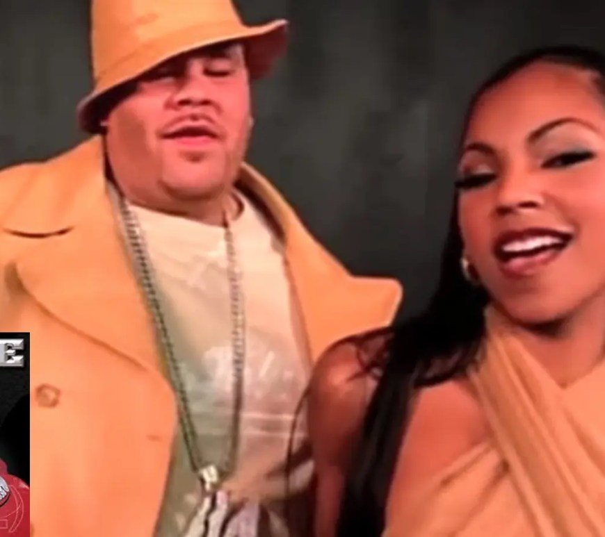 A snapshot of Fat Joe and Ashanti in the 2002 music video for What's Luv