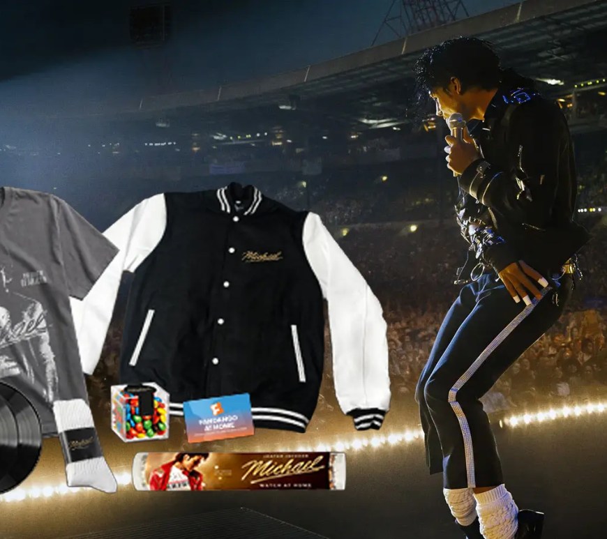 Michael biopic Ultimate Home Premiere Box featuring collectible merchandise including apparel, vinyl soundtrack, and movie-themed accessories.