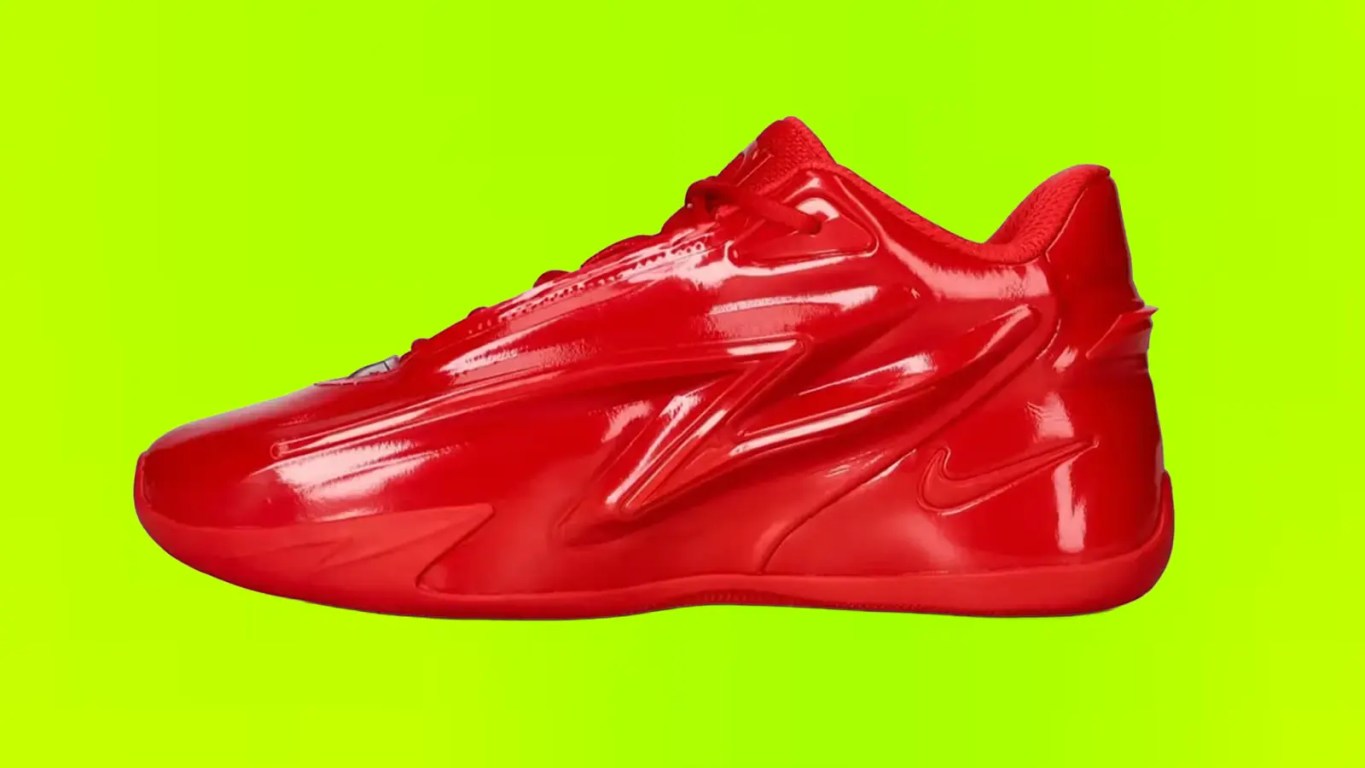 Nike KD 19 "Candy Apple" basketball sneaker in a vibrant University Red colorway featuring a sculpted upper, performance-focused design, and full-length cushioning against a lime green background