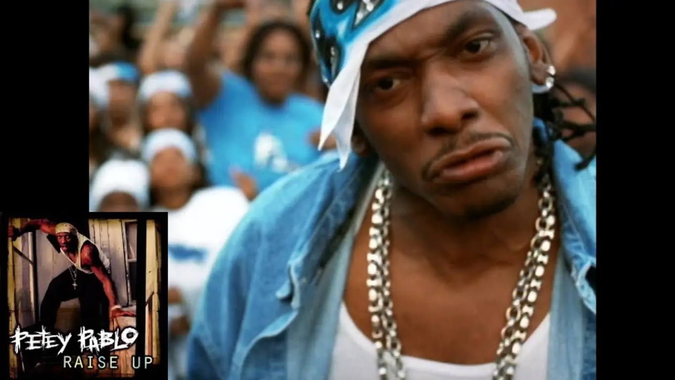 A high-contrast vintage macro showcase photo of the original Jive Records vinyl release label for Petey Pablo's 2001 anthem Raise Up.