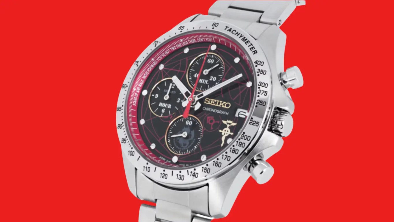 Limited-edition Seiko x Fullmetal Alchemist: Brotherhood collaboration wristwatch featuring a 39.8mm stainless steel case, a matte black dial with subtle gear designs, red and gold accents, and a distinctive Flamel symbol emblem at the 12 o'clock position against a red background.
