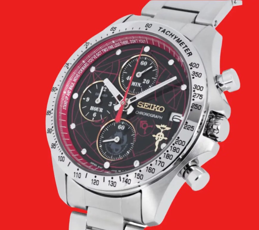 Limited-edition Seiko x Fullmetal Alchemist: Brotherhood collaboration wristwatch featuring a 39.8mm stainless steel case, a matte black dial with subtle gear designs, red and gold accents, and a distinctive Flamel symbol emblem at the 12 o'clock position against a red background.