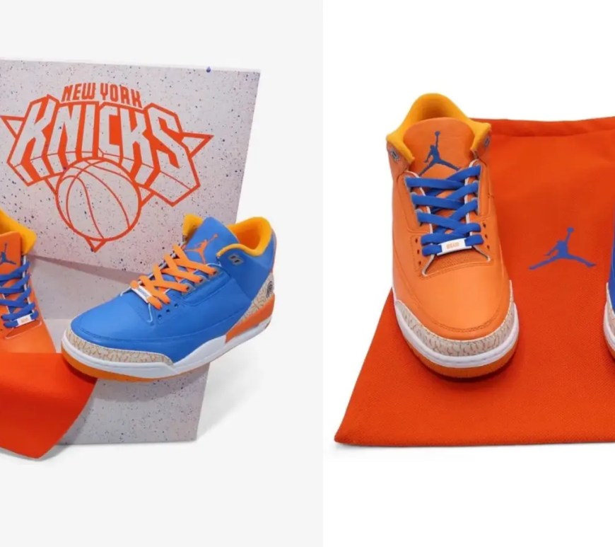 An official close-up studio photograph of Spike Lee’s custom mismatched one-of-one Air Jordan 3 Knicks PE sneakers showcasing the orange and blue leather detailing.