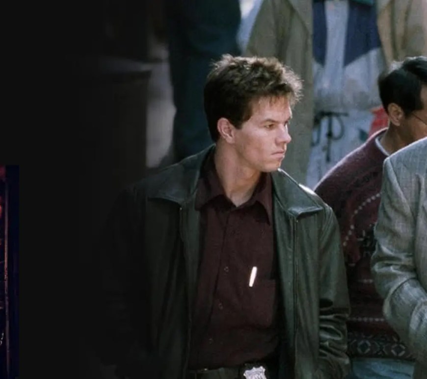 A high-visibility noir cinematic film still from the 1999 movie The Corruptor, featuring Chow Yun-Fat and Mark Wahlberg in a tense tactical New York undercover police operations sequence.