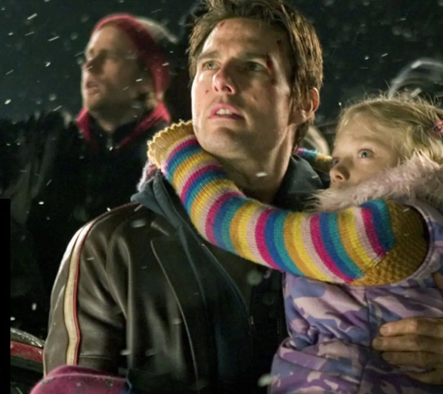 Tom Cruise in War of the Worlds (2005), depicting a tense sci-fi survival scene during an alien invasion directed by Steven Spielberg